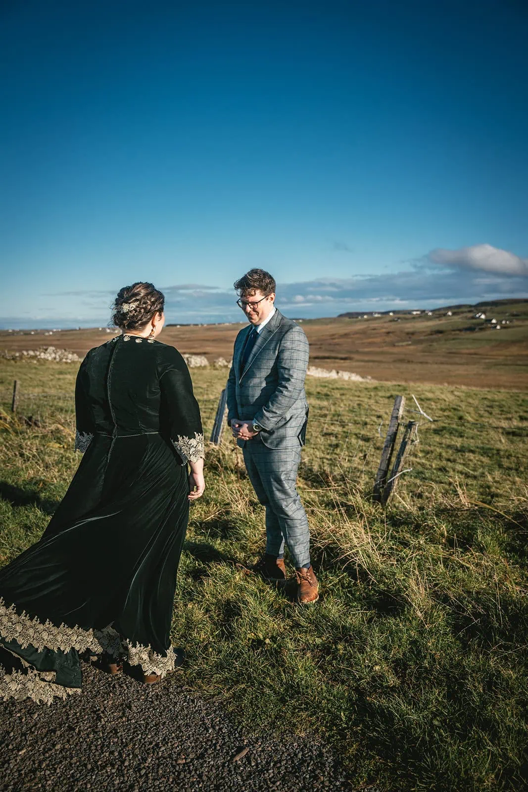 Groom seeing his bride in her wedding dress for the first time during their Skye elopement