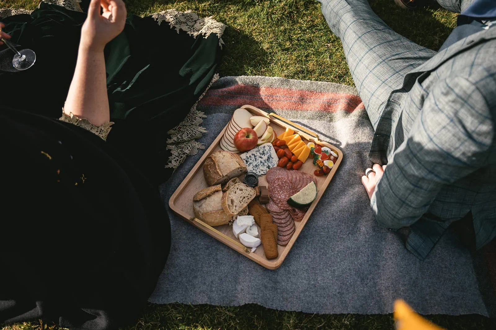 Elopement picnic setup with Scottish tartans and rustic details