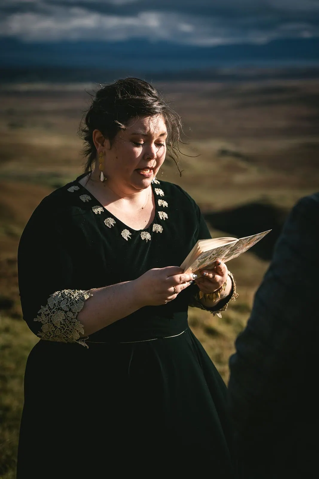 Bride reading her vows to her groom, a romantic Skye elopement ceremony