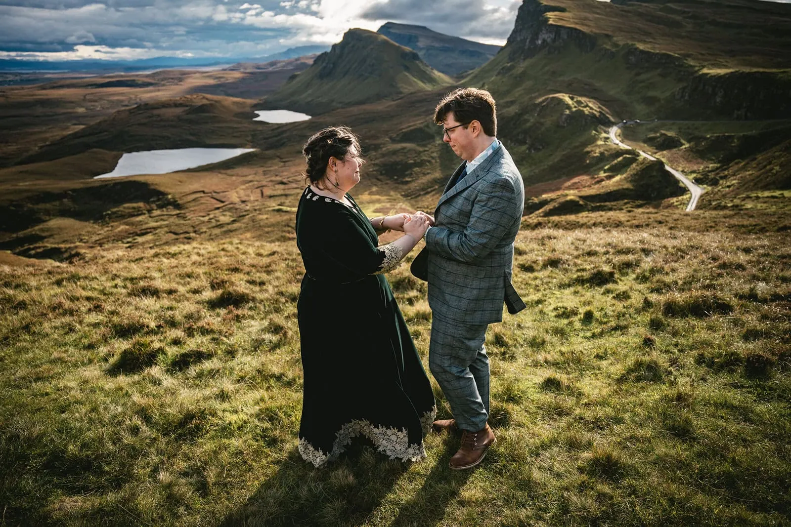 Newlyweds' reflective pause in their Skye elopement ceremony