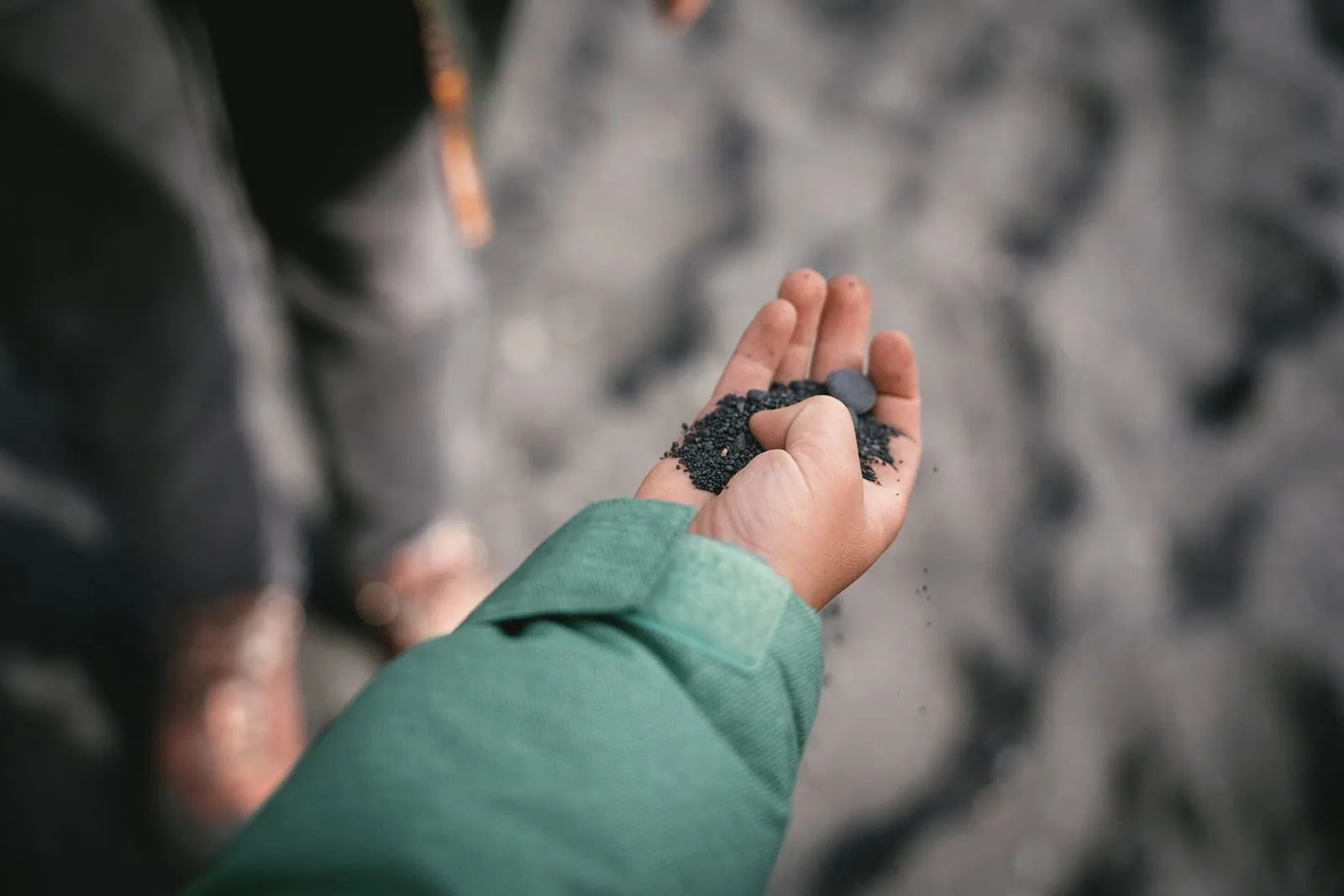 Detail of an Icelandic black sand beach, during a Mulafjulfur elopement