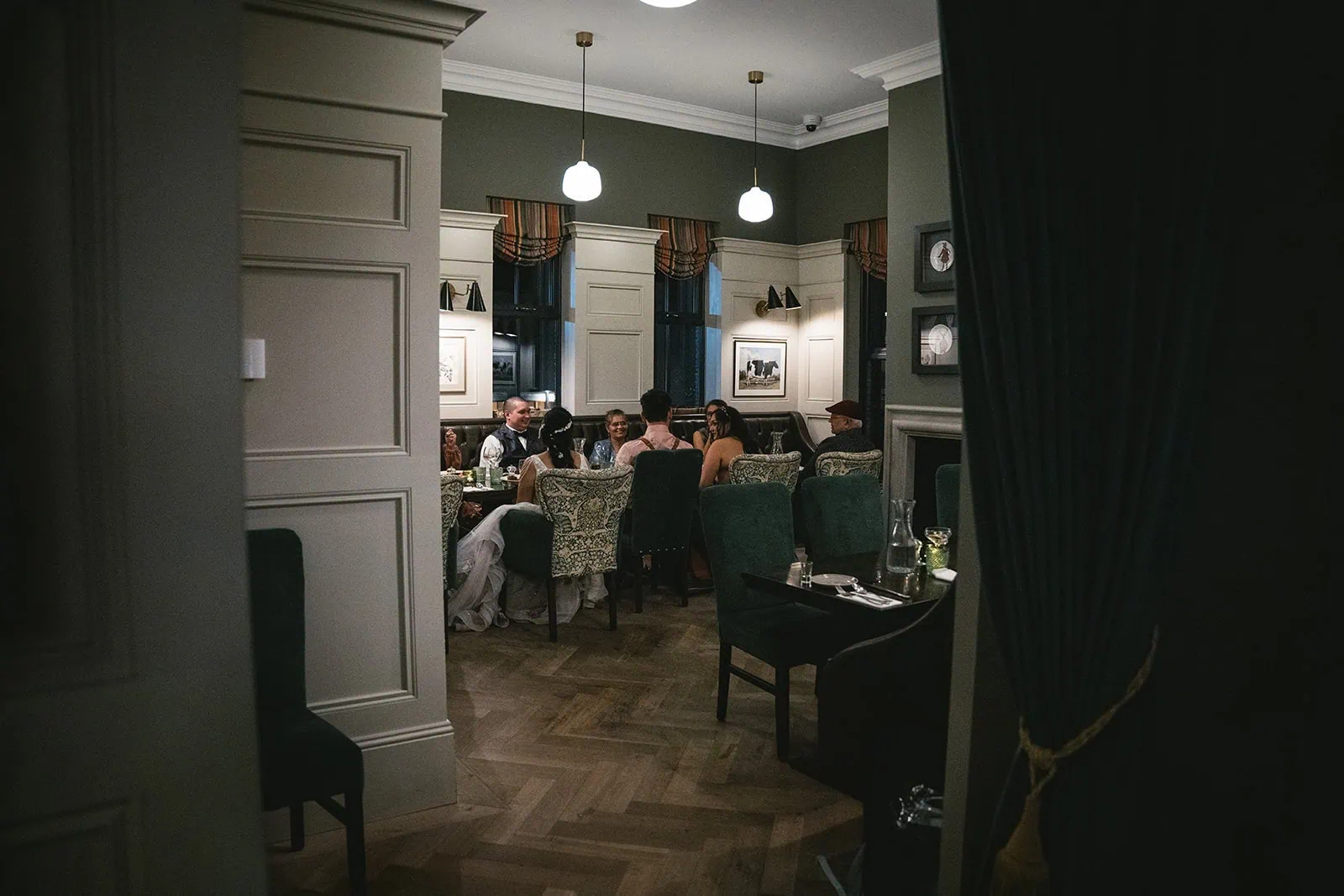 Newlyweds celebrating their Dunluce Castle elopement with their guest
