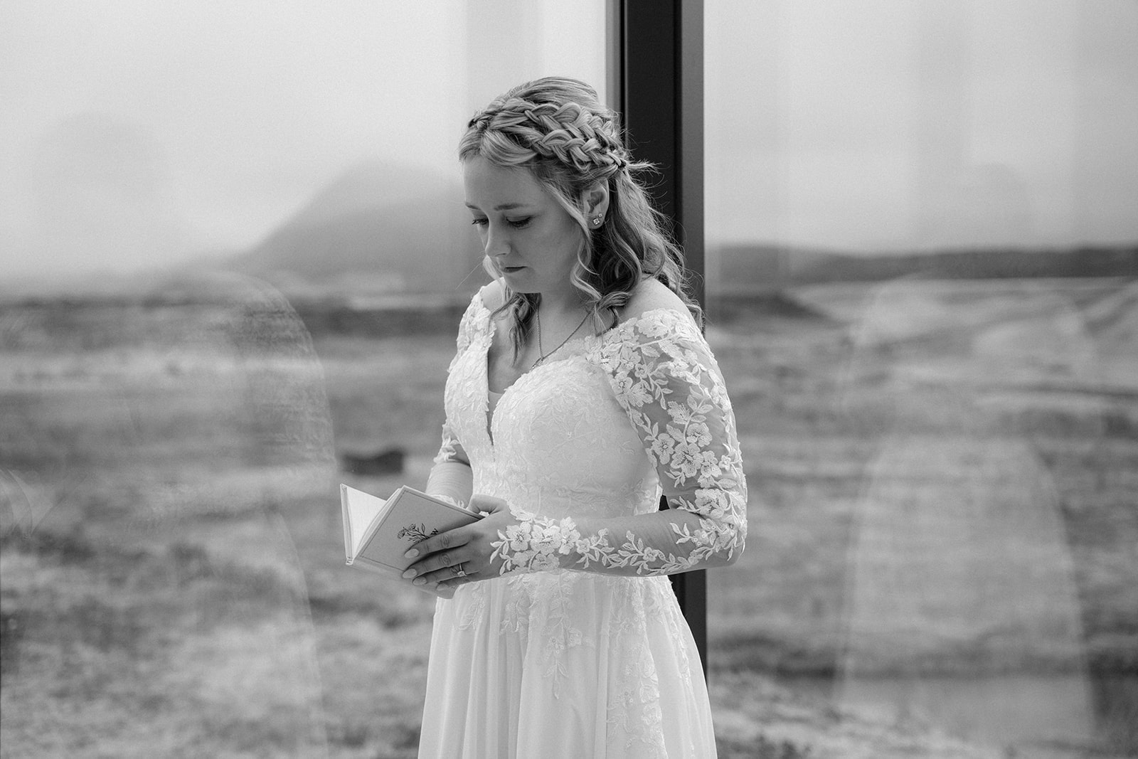 The bride preparing her vows during her Iceland adventure elopement