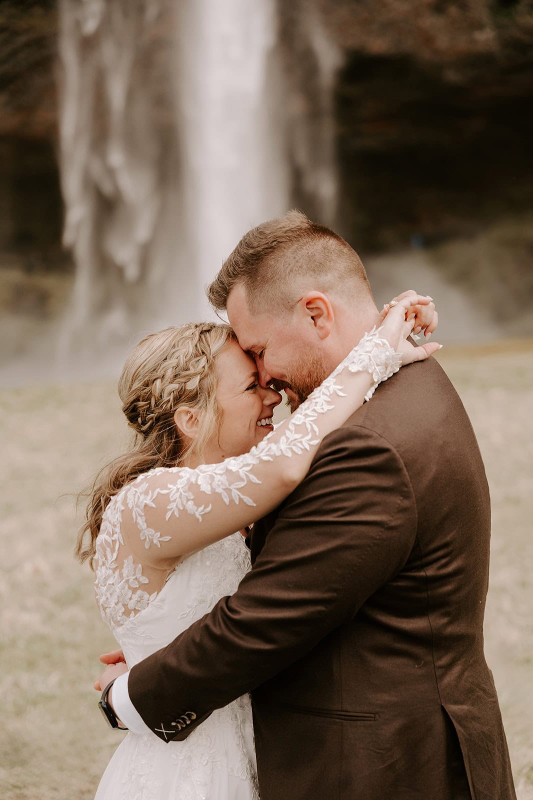 Breathtaking view of the Icelandic waterfall during a romantic elopement