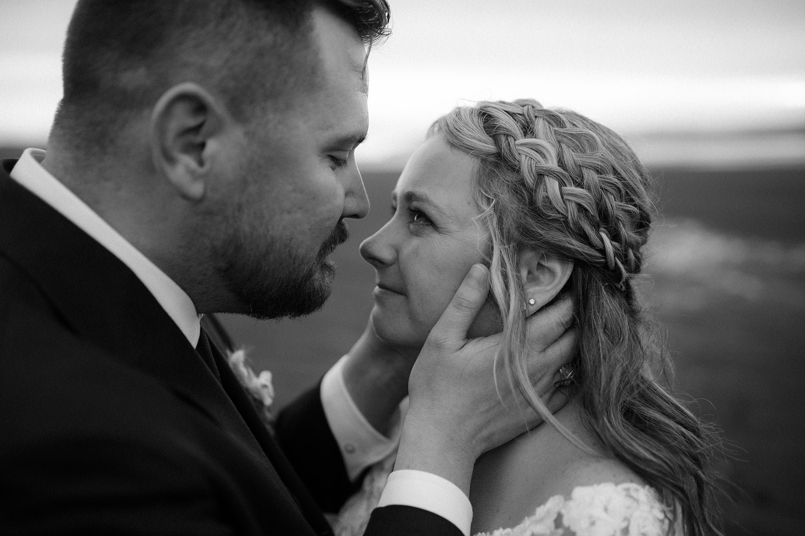 A close-up of the couple gazing at each other during their Iceland elopement.