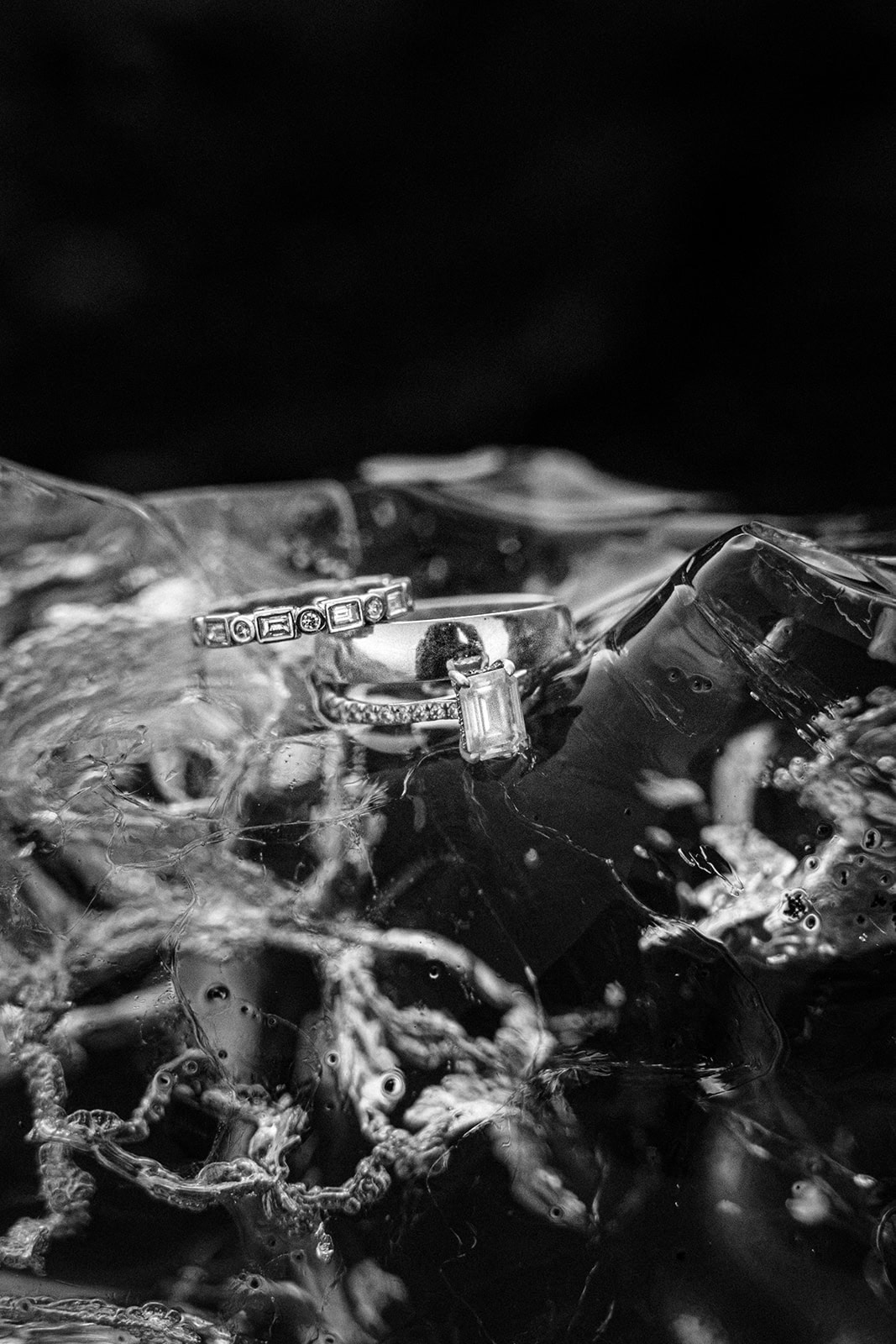 A beautiful shot of the wedding rings at an Iceland waterfall elopement