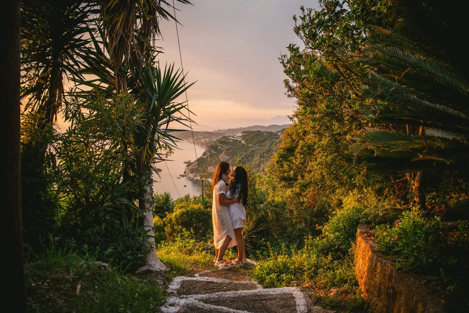 Intimate sunset kiss in perfect golden light, demonstrating the expert timing and location knowledge included in our elopement packages in the Azores