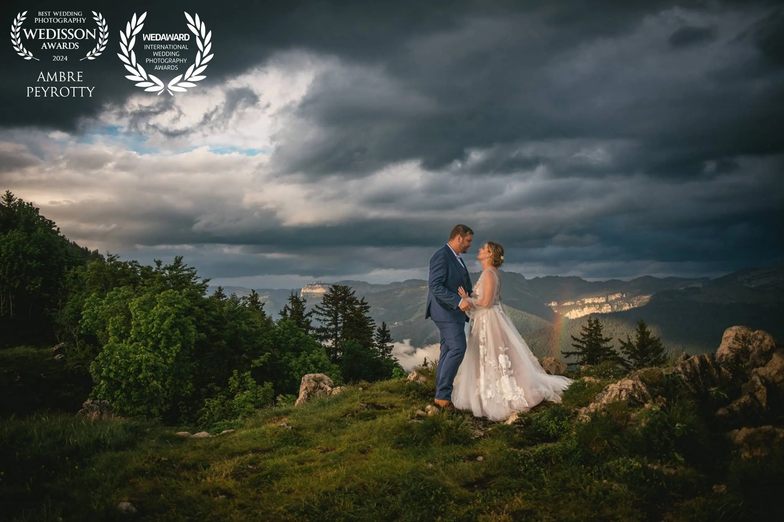 Couple facing each other beneath dramatic mountain sky, showcasing the powerful moments included in our 2-day Jedi Chronicles elopement package in New Zealand