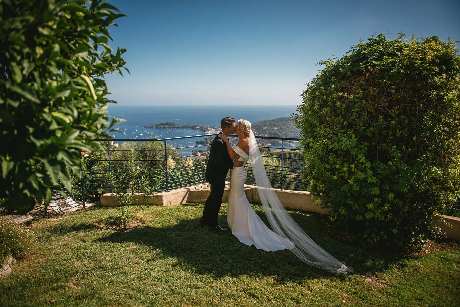 Tender moment between the bride and the groom in theirs wedding attire during a South of France elopement