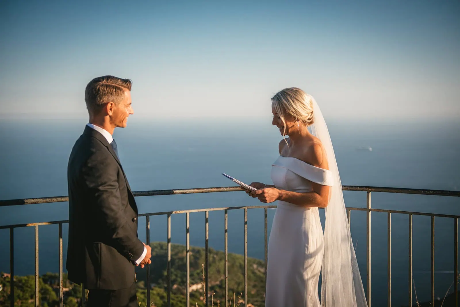 Couple exchanging heartfelt vows during their South of France elopement ceremony