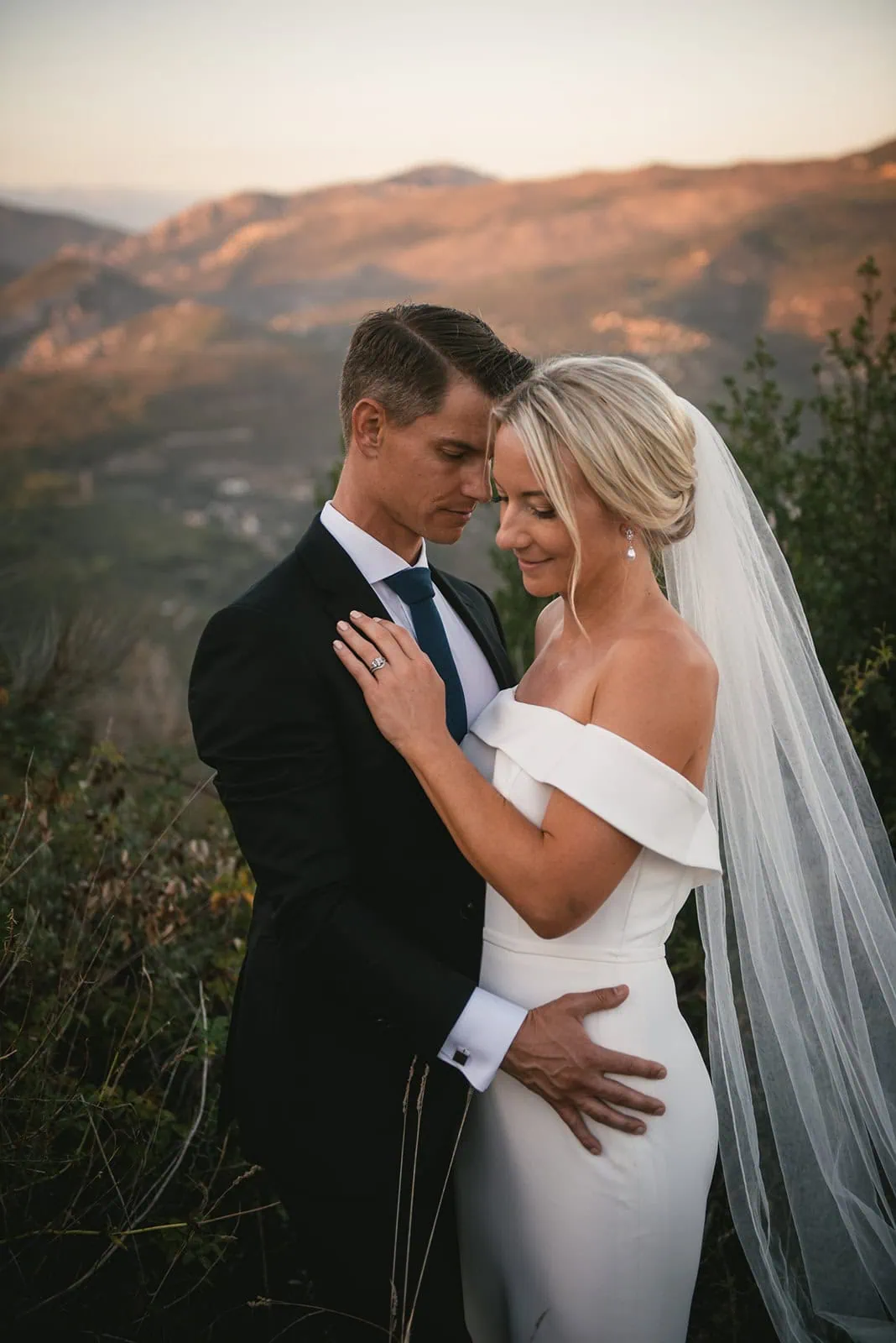 The couple sharing a quiet moment together during their South of France elopement