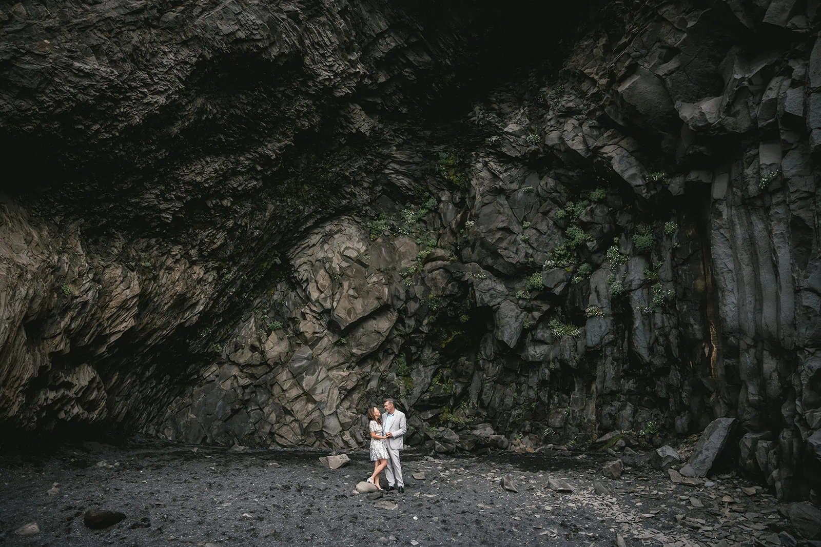 The couple’s silhouette against a dramatic Icelandic backdrop during their engagement shoot