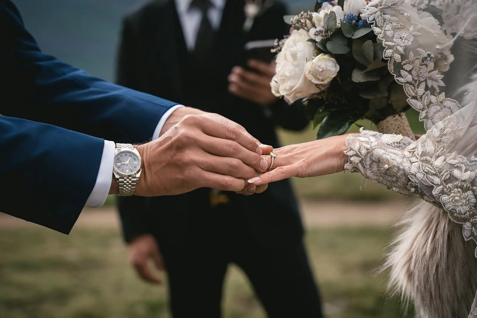 Focus on the exchange of rings, in a deeply personal ceremony during their Zermatt elopement
