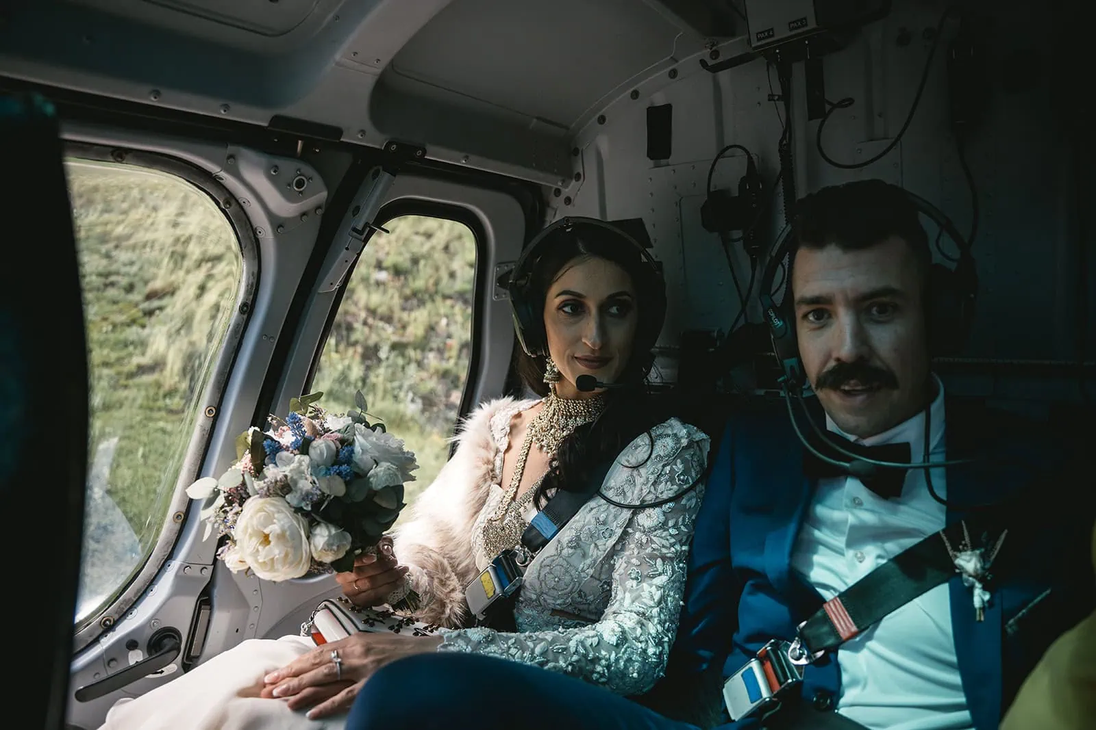 Bride and groom ready for their helicopter ride over the Swiss Alps during a Zermatt elopement