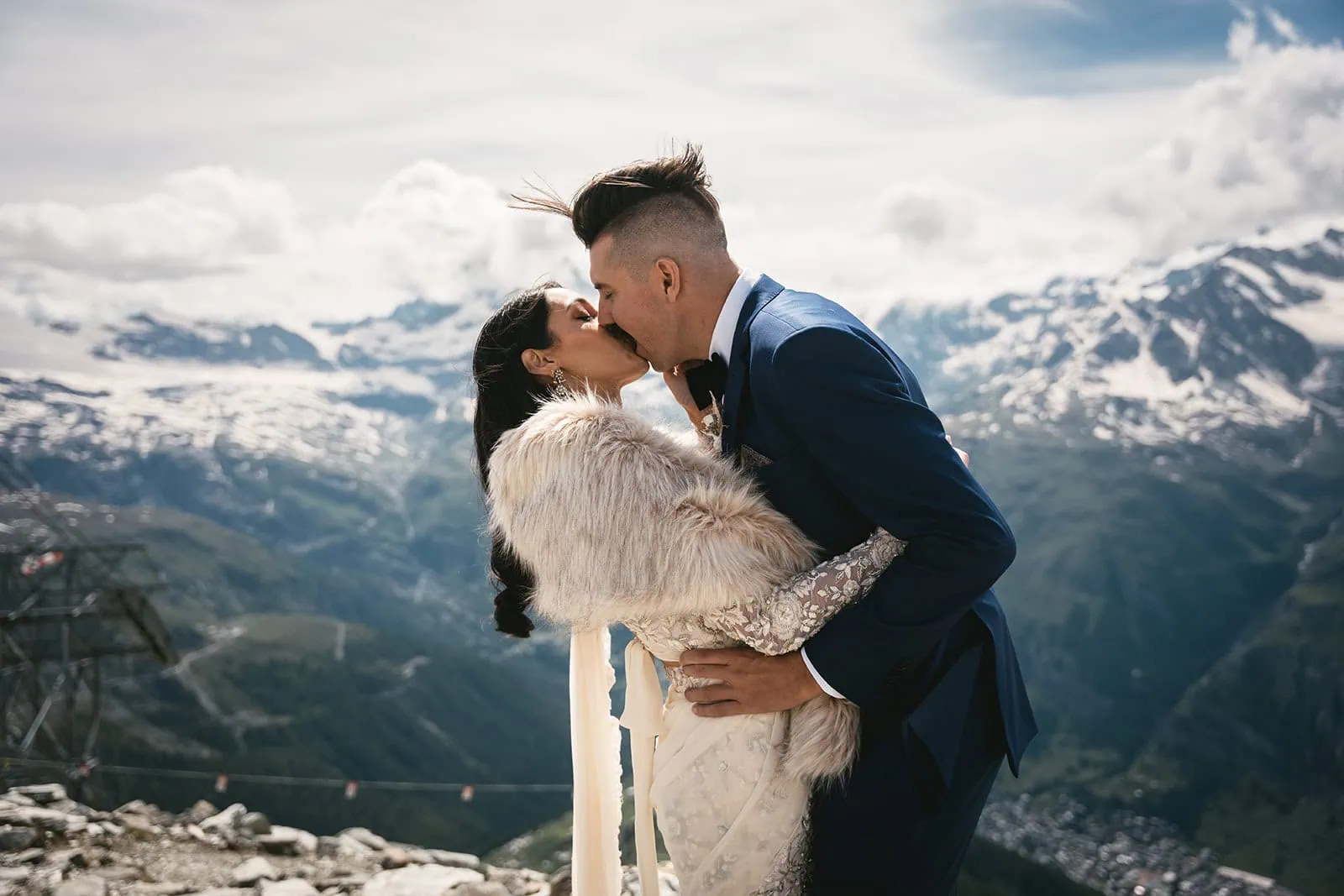 Epic kiss at a Swiss mountaintop during a Zermatt elopement