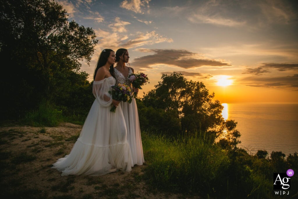 Authentic couple moment showcasing Santorini's iconic sunset glow in my elopement packages