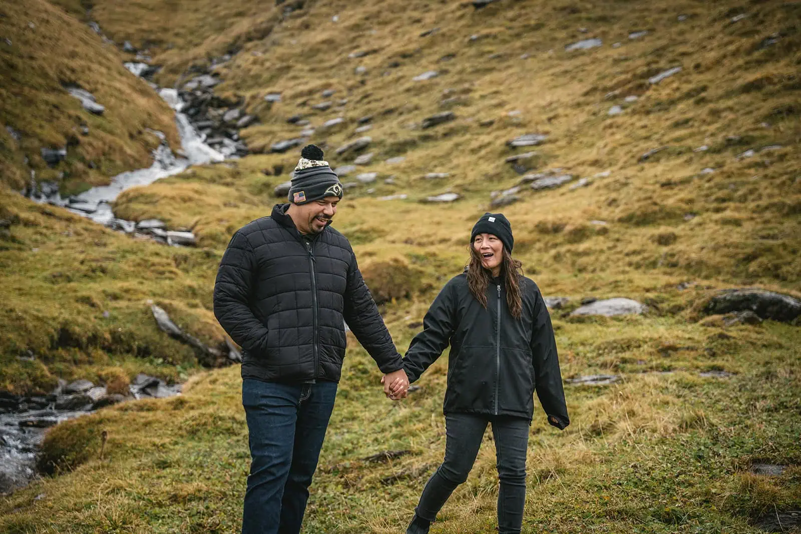 Couple walking to their mountain restaurant for their engagement shooting during their Gornergrat elopement