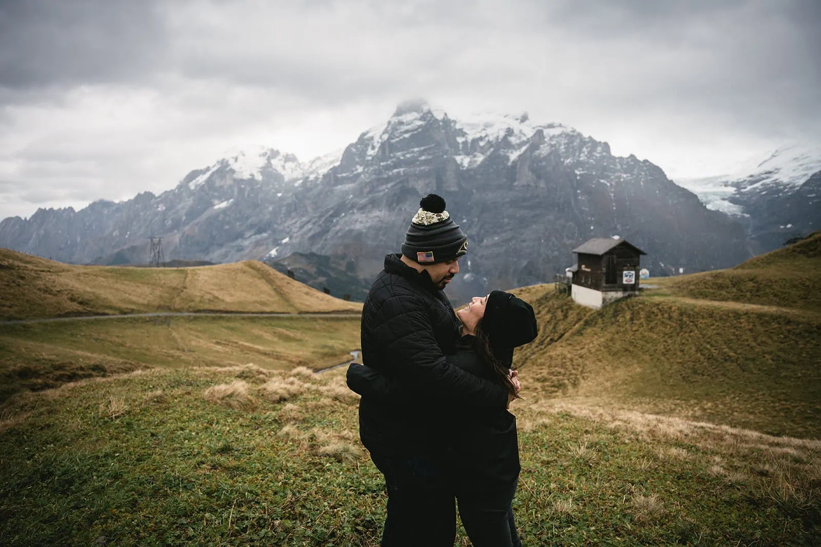 Laughter during a playful photoshoot before their Gornergrat elopement day