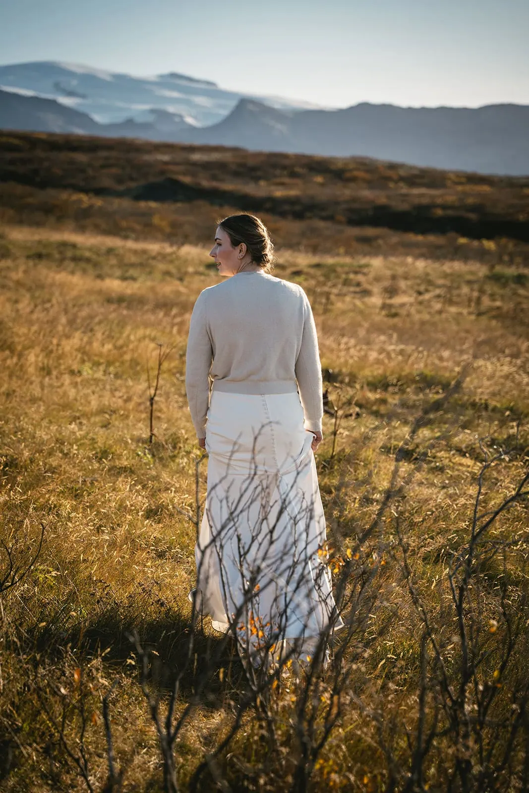 Quiet morning as the bride exploring nature in her Hofn elopement