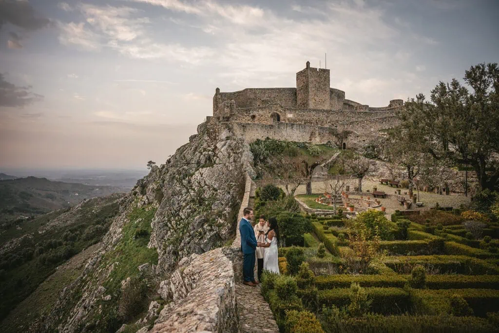 A pastel sky and whispered vows — Lisbon elopement dreamscape.