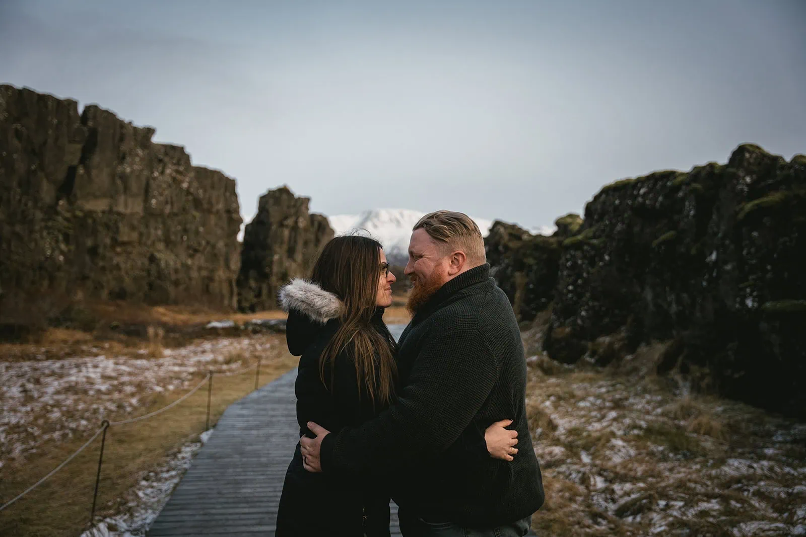 Joyful embrace during a peaceful moment of their Vik elopement