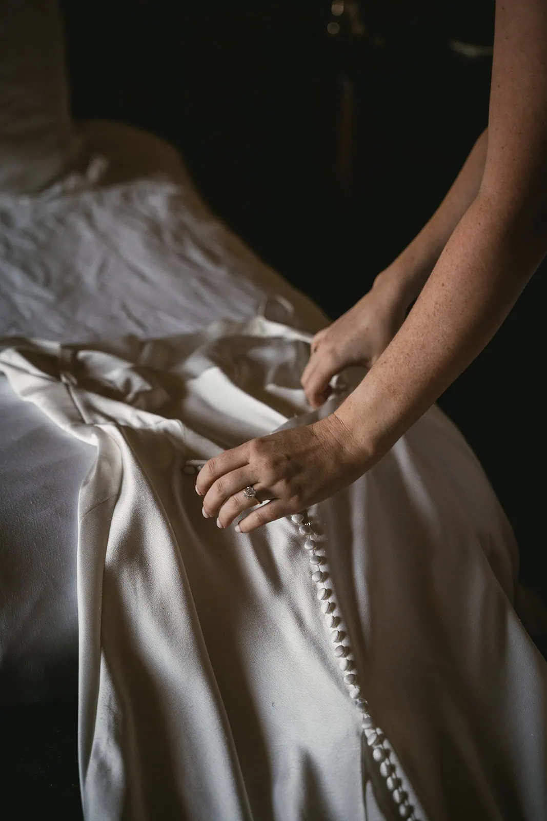 The peaceful ritual of getting dressed for a Corsica elopement