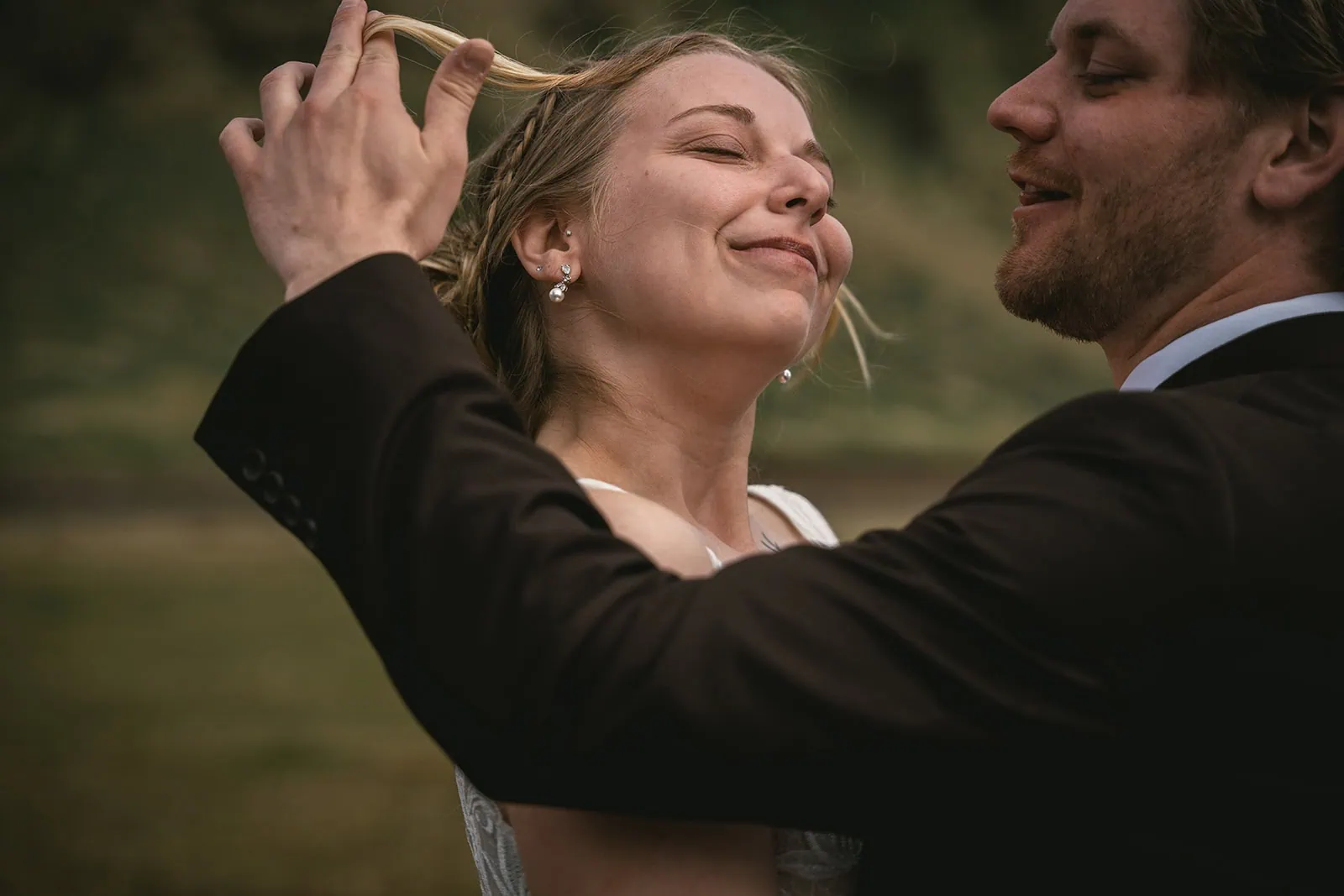 Tender moment between the bride and groom in their Reynisfjara elopement