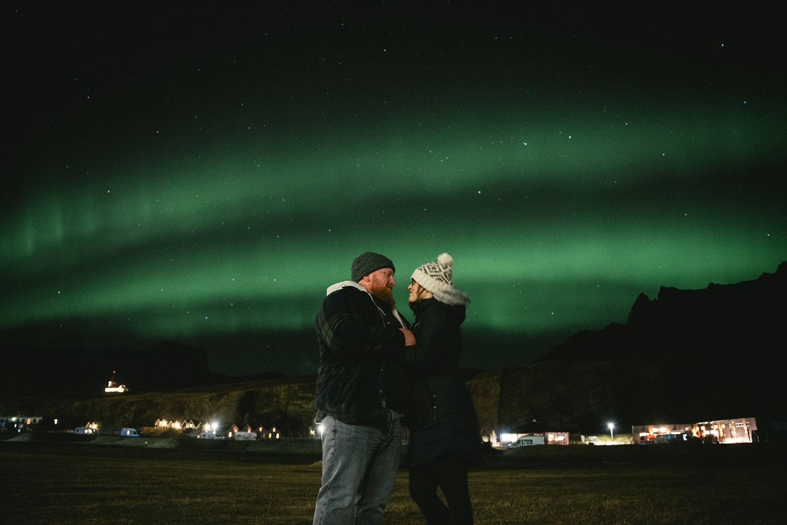 Couple eloping beneath the northern lights in Iceland