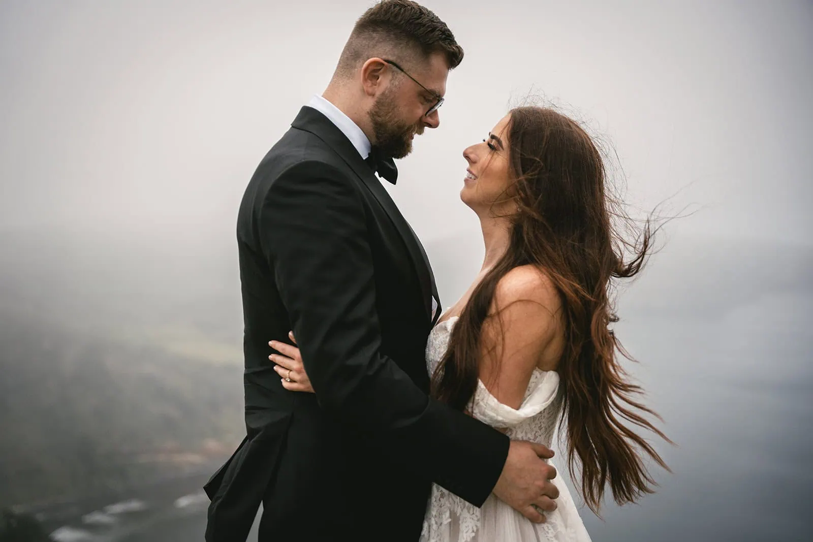Windswept cliffs and soft embraces during this dreamy Ponta Delgada elopement