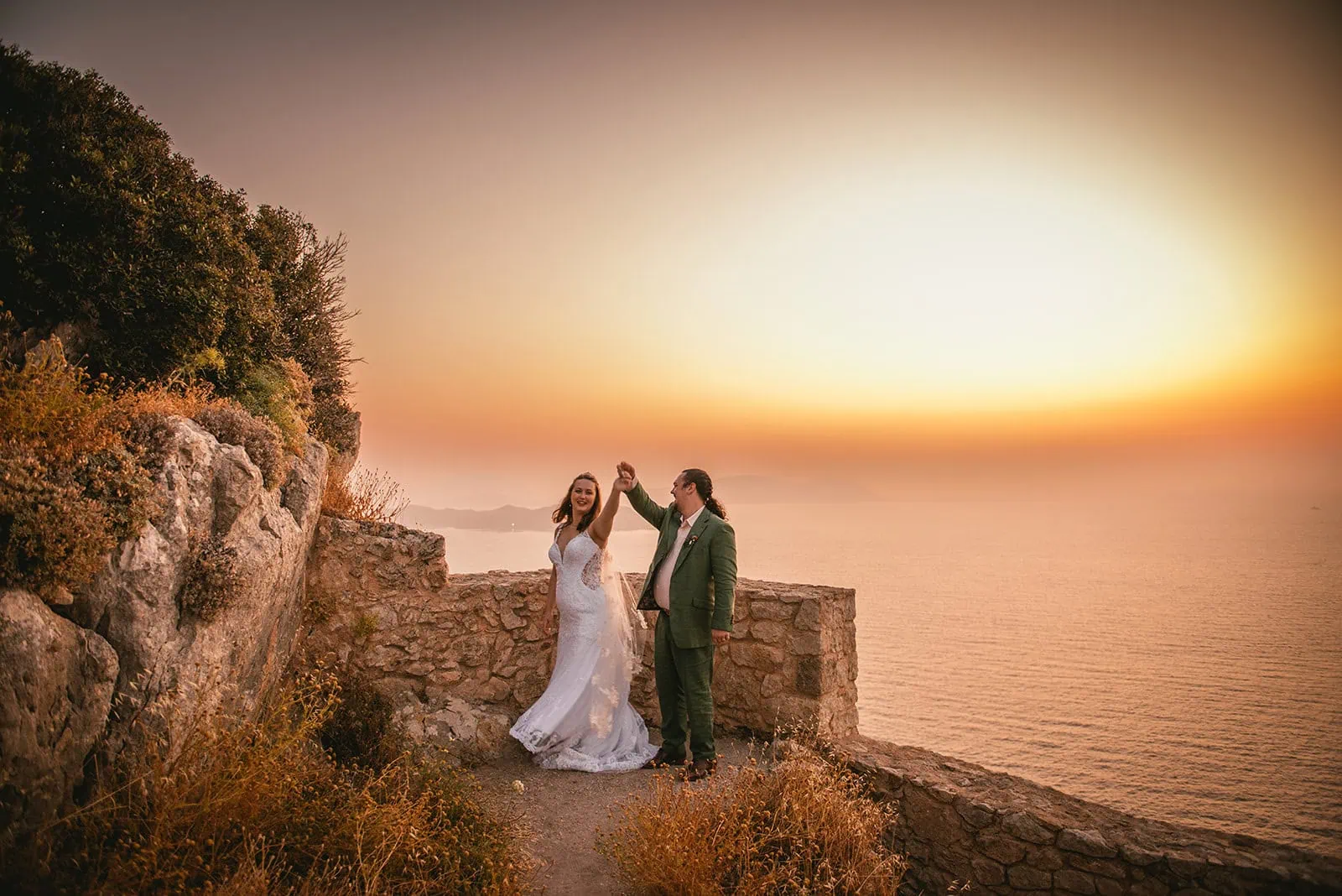 Sharing a dance at sunset during their Rhodes Island elopement