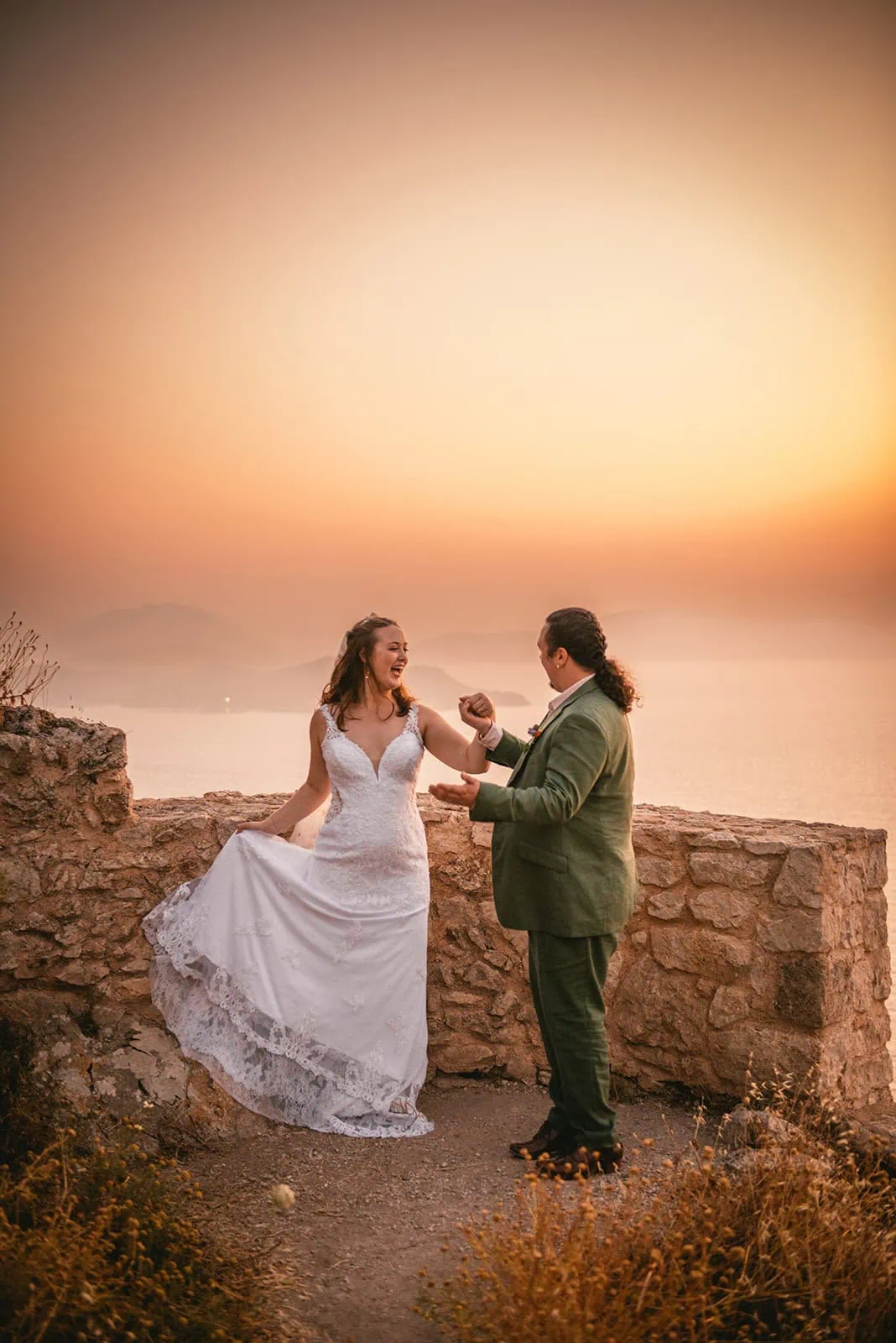 A romantic dance at sunset in a Rhodes Island elopement adventure