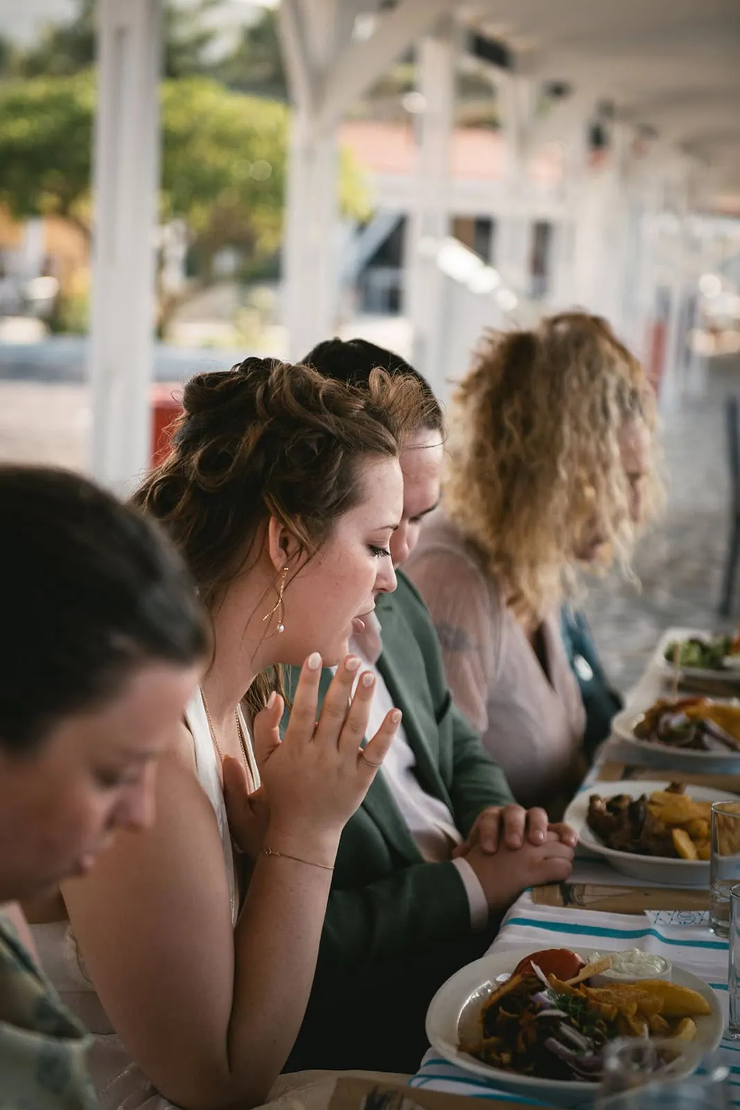 Enjoying Greek dishes in a Rhodes Island elopement