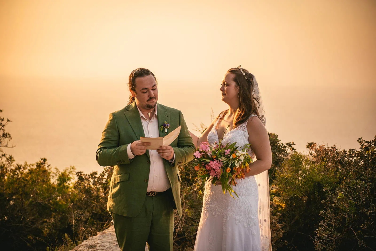 Joyful vows at sunset in a Rhodes Island elopement