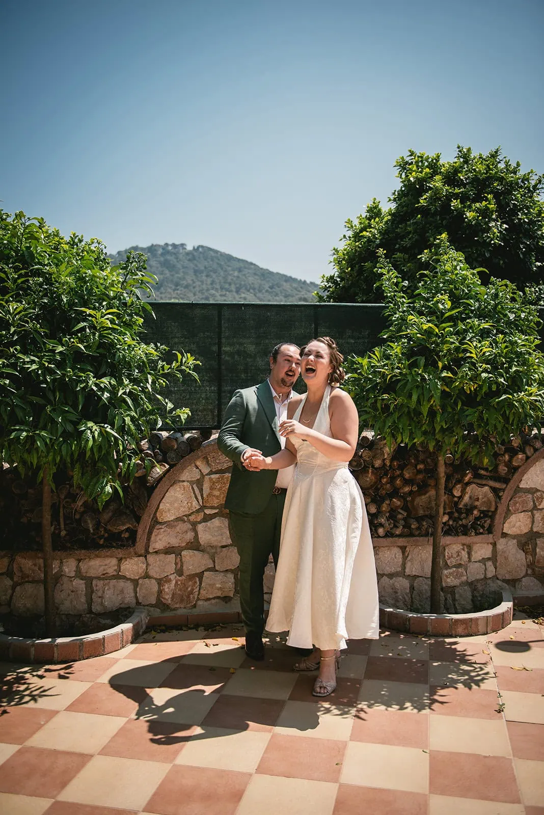 Laughter in the air as they begin their Rhodes Island elopement