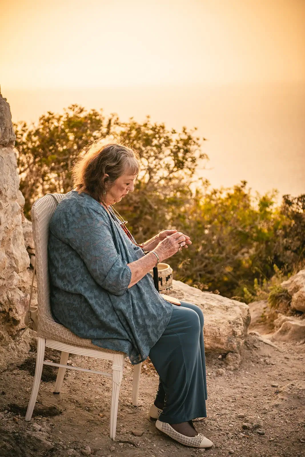 Guest during a Rhodes Island elopement ceremony at sunset