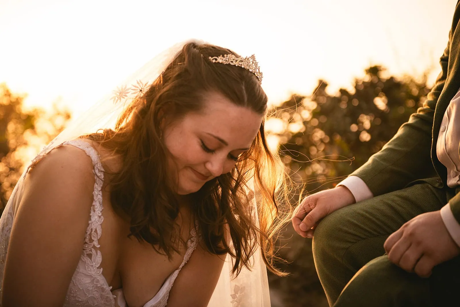 A tender act beneath the Aegean sky — their Rhodes Island elopement included a foot-washing ceremony to symbolize mutual devotion