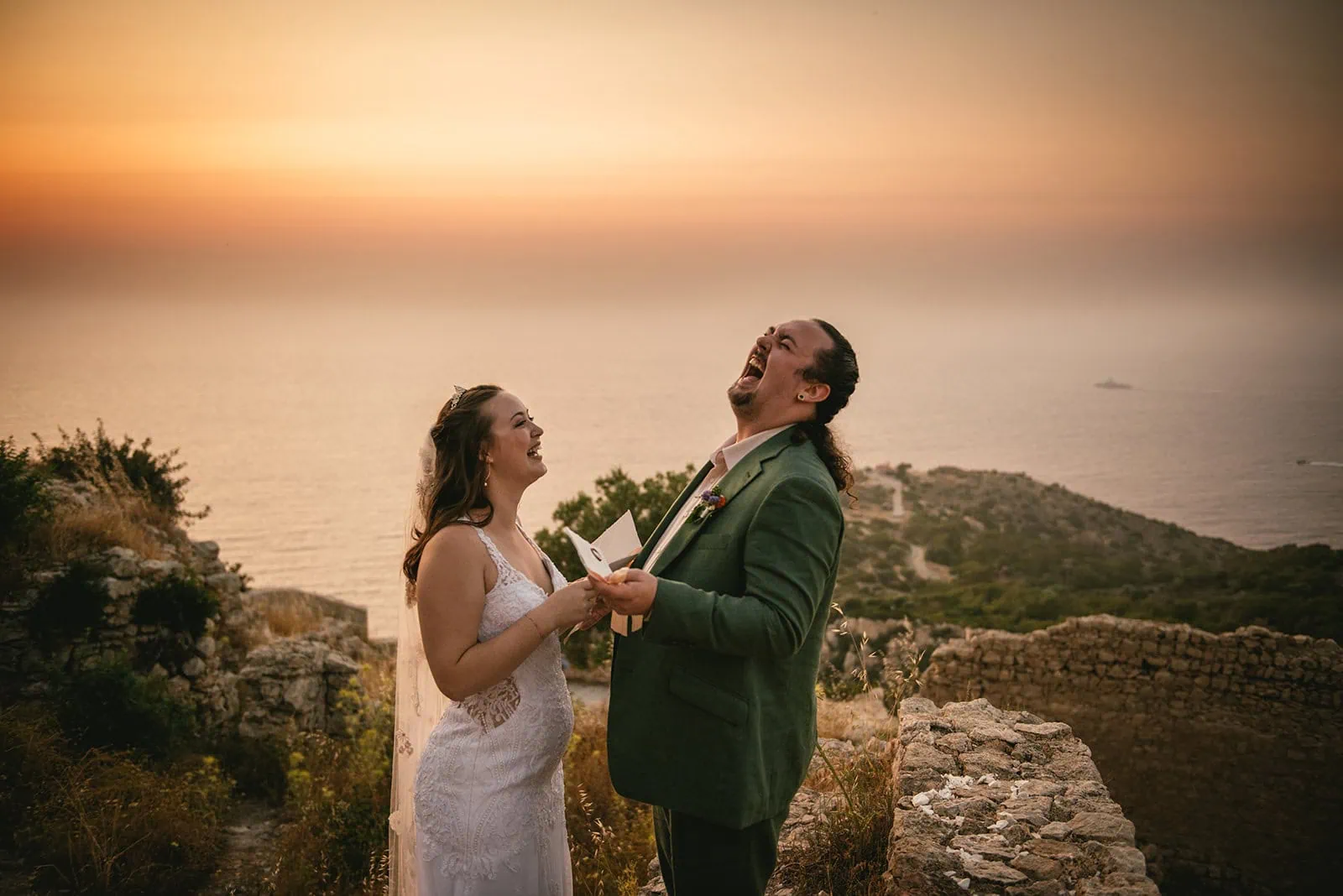 Sharing a laughter at sunset in their Rhodes Island elopement