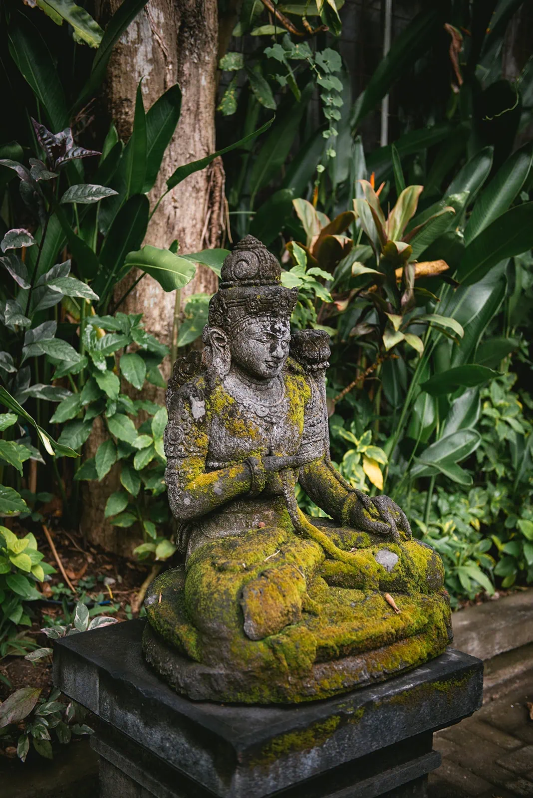 A sacred statue in the heart of the jungle in a Bali elopement
