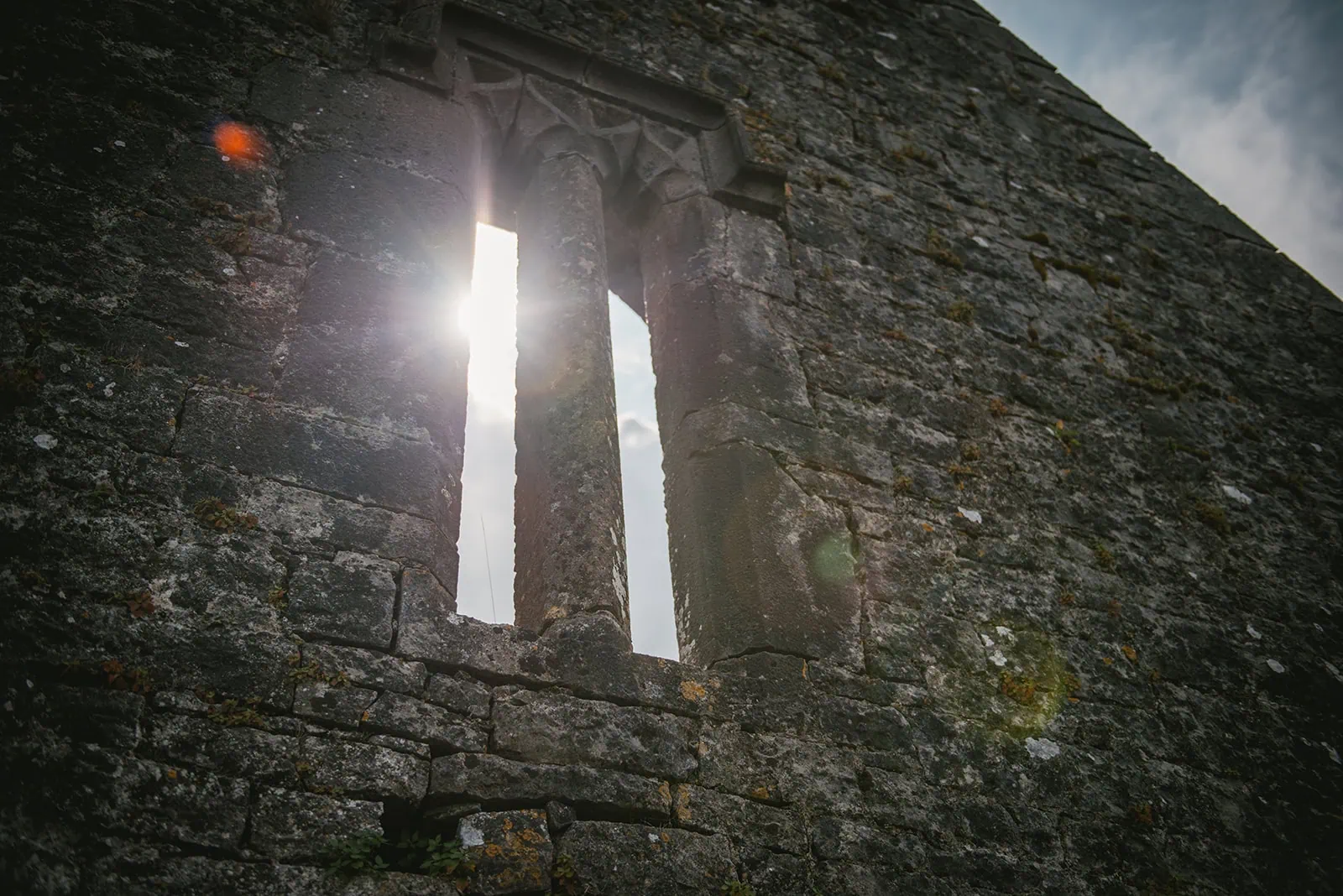 Morning light through the ruins in an Ireland elopement