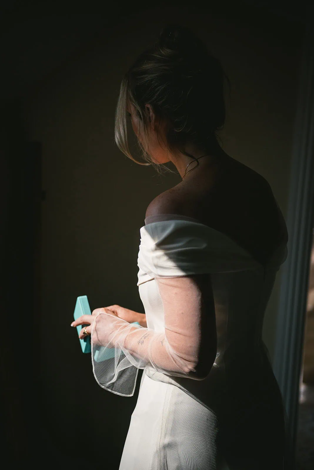 A quiet moment in the hotel room before the first look – anticipation of this Ireland elopement