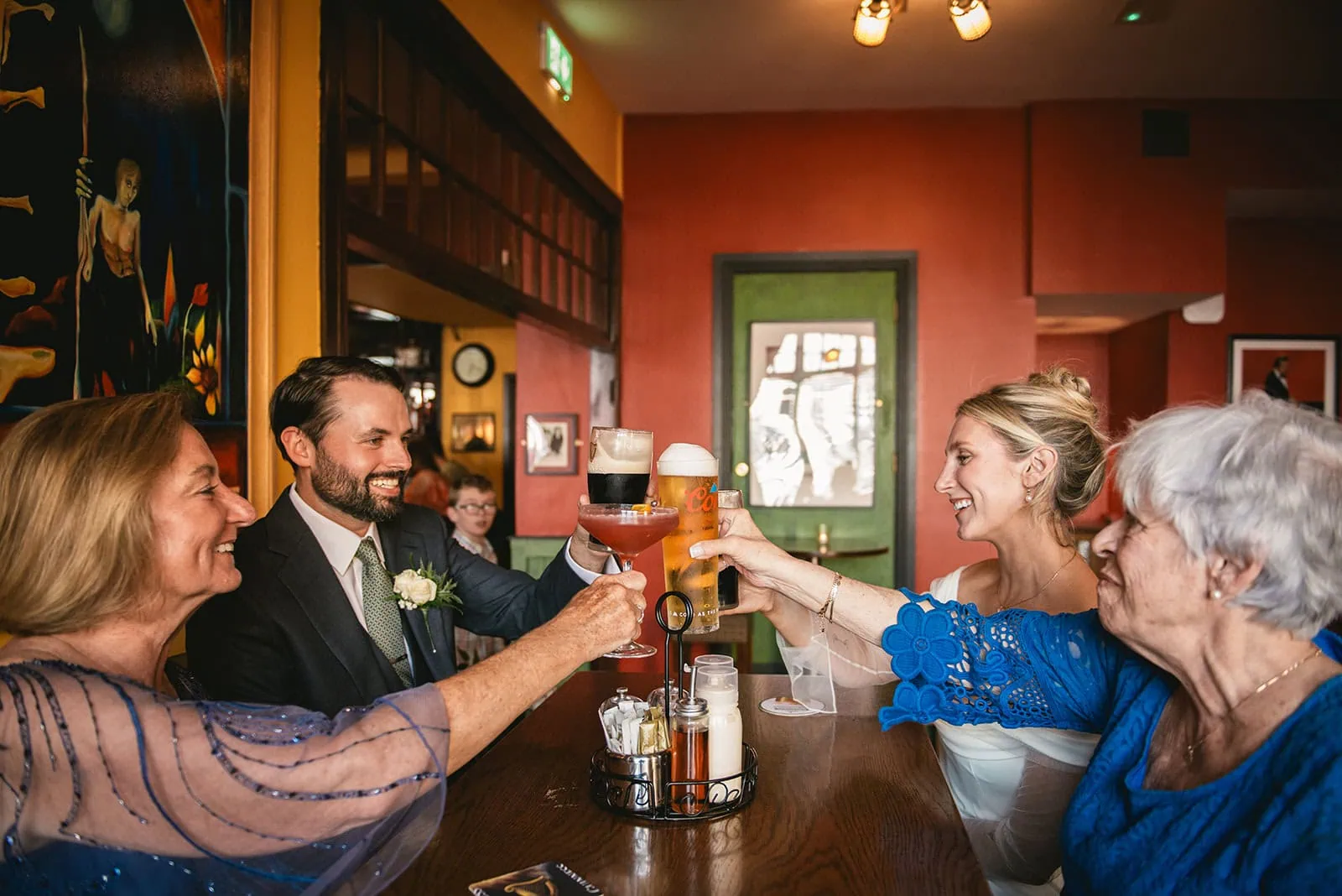 Mums sharing a toast as the couple gets ready for their Ireland elopement ceremony