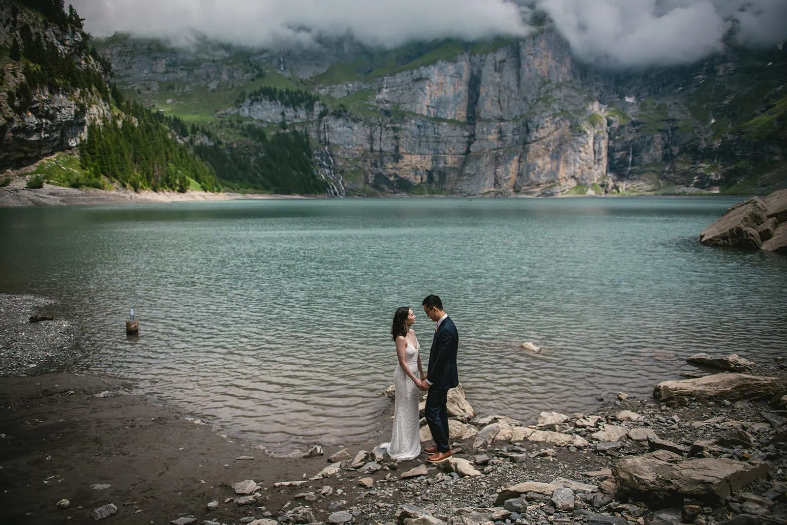 Misty mountains cradled their vows during this Oeschinensee elopement