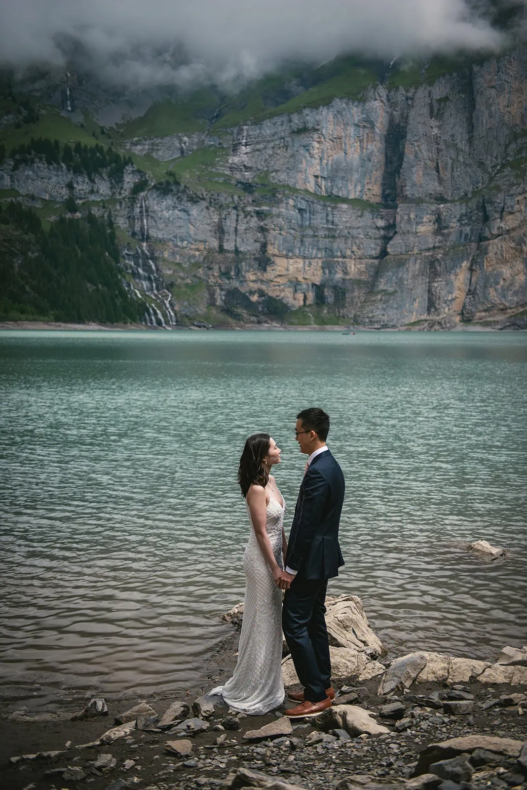 The stillness of the lake mirrored the quiet excitement of their Oeschinensee elopement