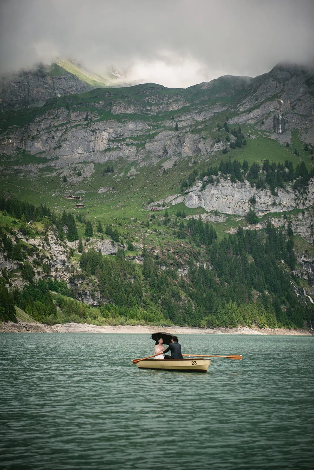 The reflection in the lake held their new beginning—Oeschinensee elopement