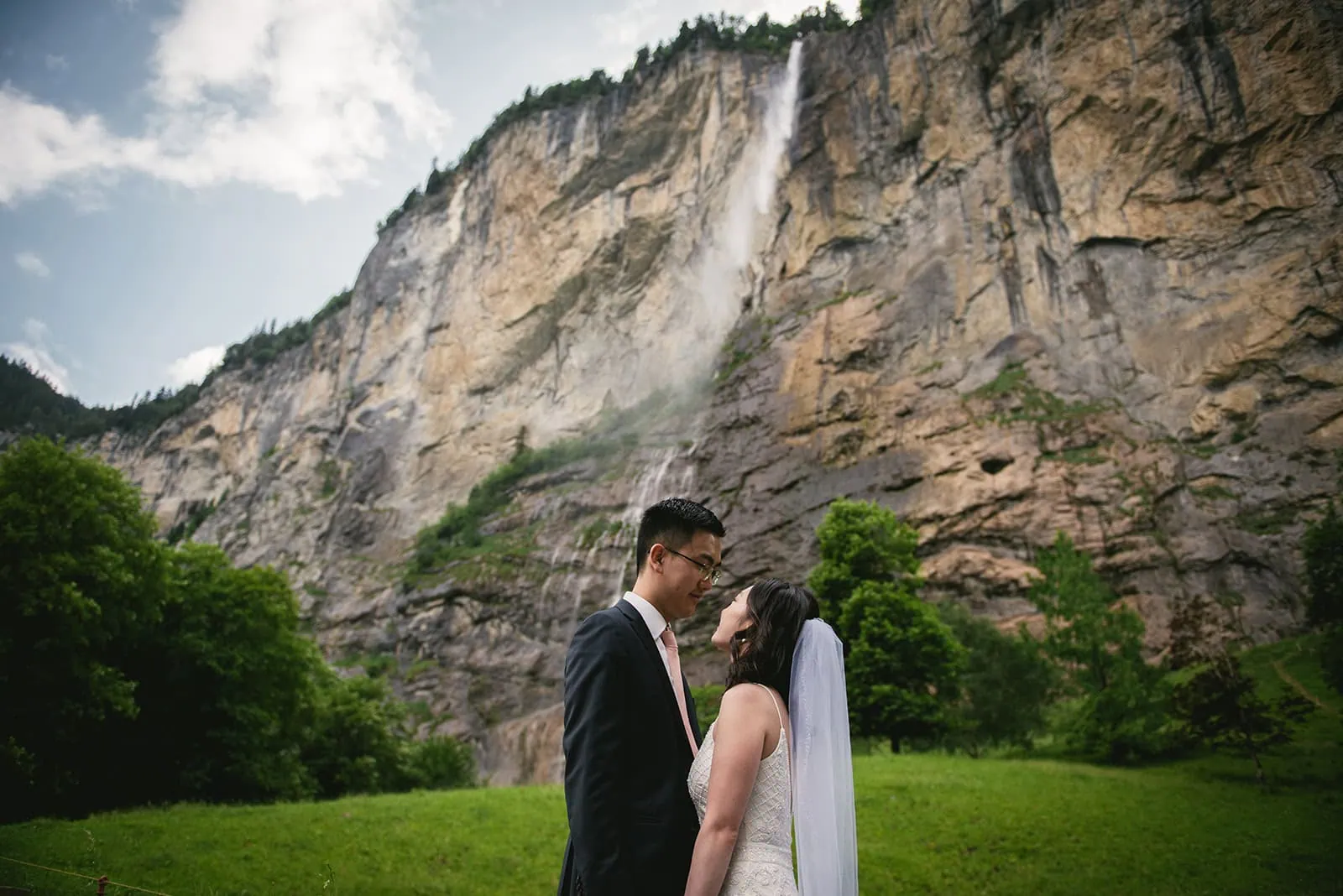 The waterfall testifying to their love during their Oeschinensee elopement