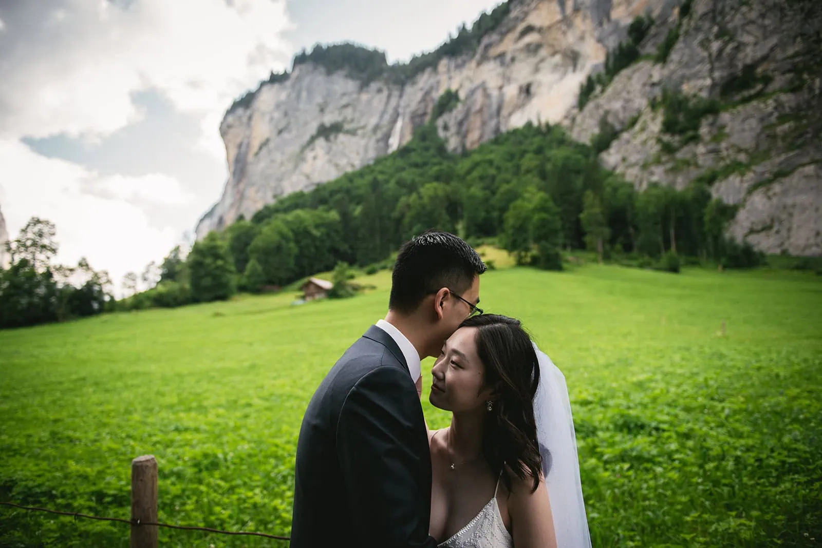 Love unfolded slowly between peaks during this Oeschinensee elopement