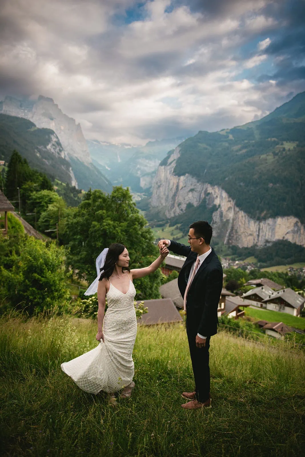 Layers of fog and fabric danced in the wind—Oeschinensee elopement bliss