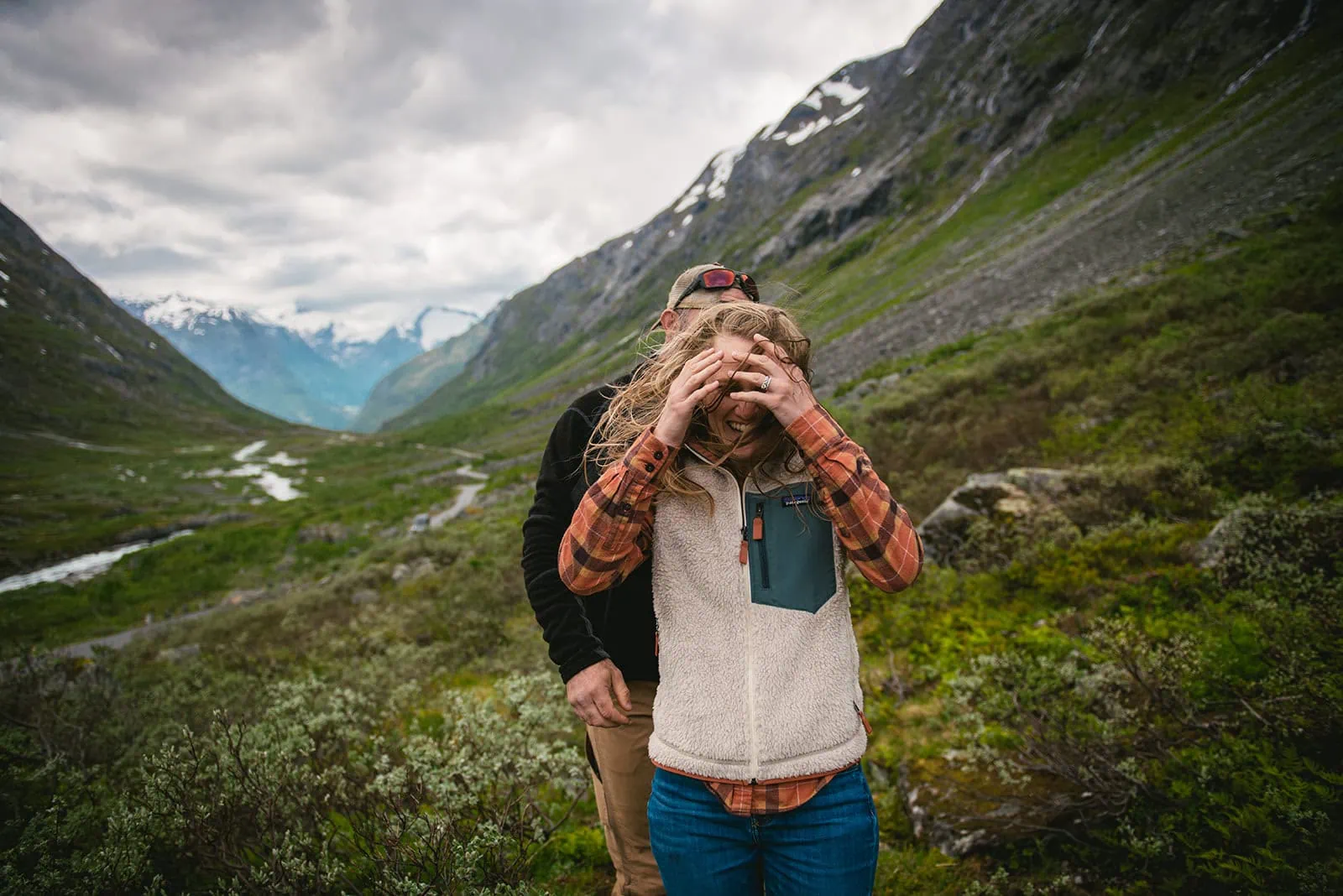 Laughter in the wind during a fjords elopement adventure in Norway