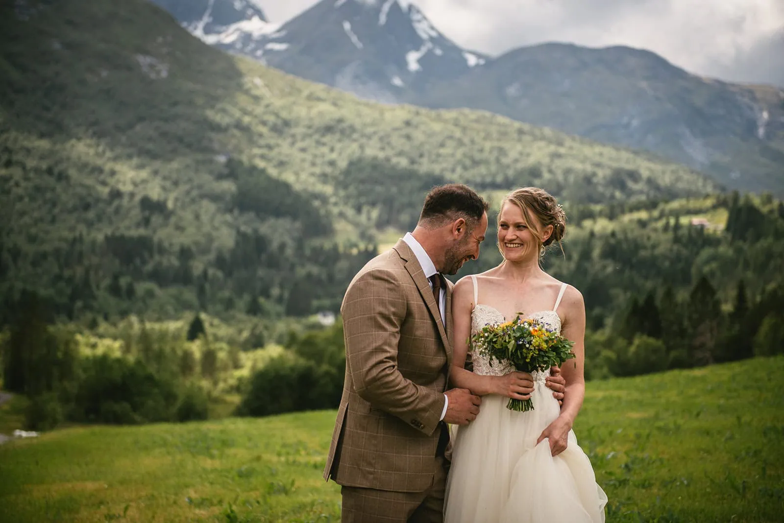 Tender moment at the beginning of their fjords elopement in Norway
