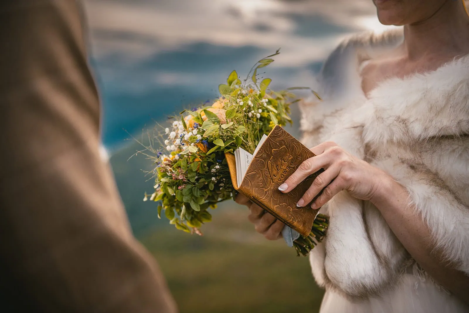 The couple reads their vows during their fjords elopement ceremony